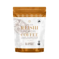 reishi svampekaffe hele bønner i plast pose med orange nuancer