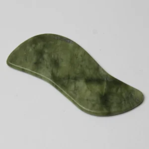 grøn gua sha jade redskab med spil