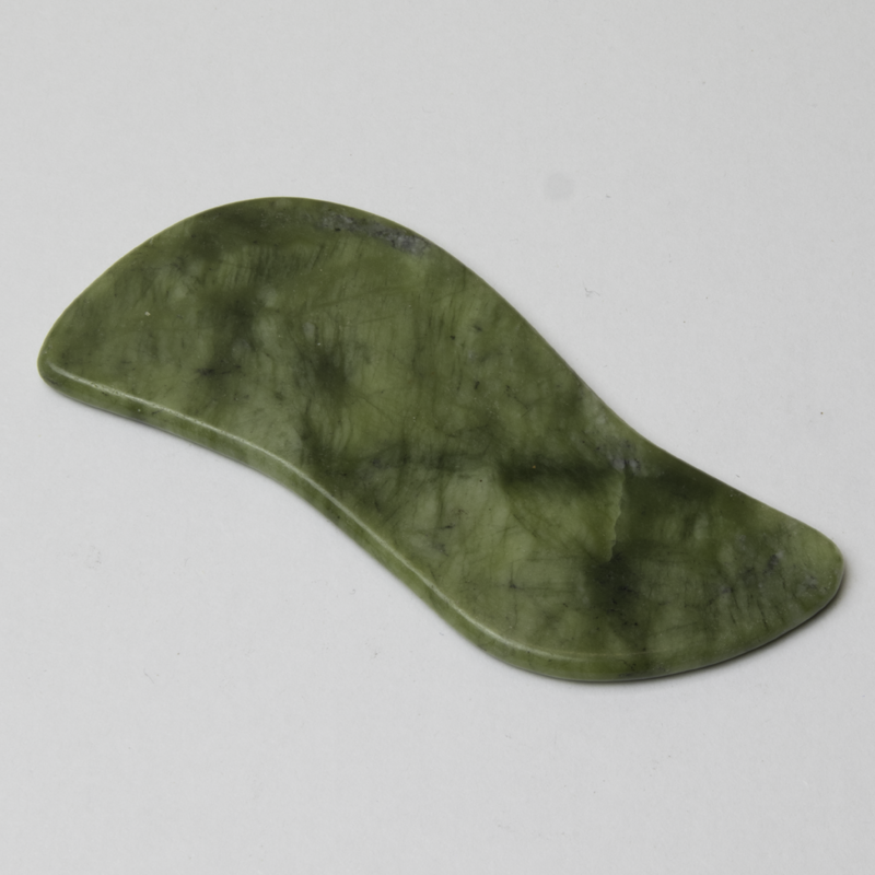grøn gua sha jade redskab med spil